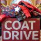Red and white flyer for the Rosie's Wish Coat Drive, featuring the text "COAT DRIVE" in large letters and a graphic of a coat.